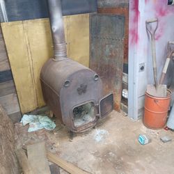 Freestanding cast irowood burning