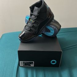 Air Jordan 11 Retro (Black / Gamma Blue) Size: 9.5