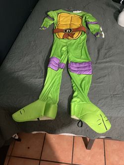 TMNT Donatello Kids Halloween Costume kids size large I’m guessing it’s for 12-14