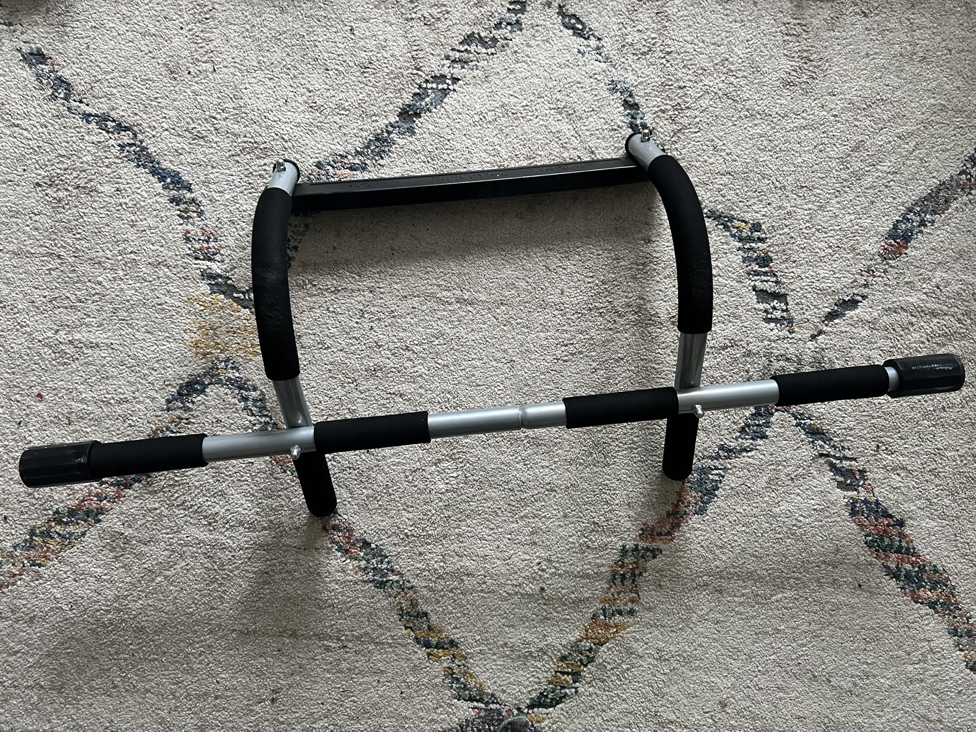 5$.Foldable home pull-up bar.