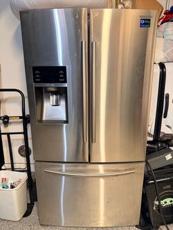 Samsung Refrigerator + Freezer combo.