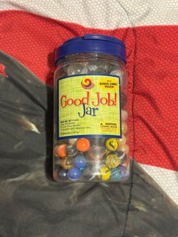 Plastic Jar of marbles