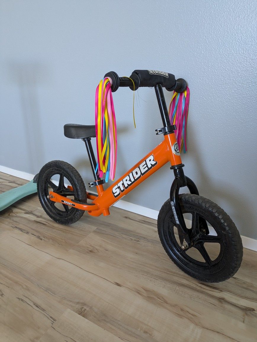 Strider 12 Sport Bike And Globber Stroller