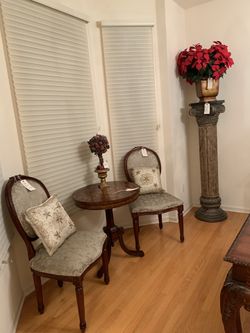 Two chairs $75 each round table 200