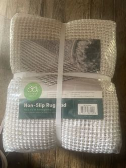 2 new non slip rug pads