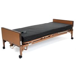 One hospital bed with arm rests !
