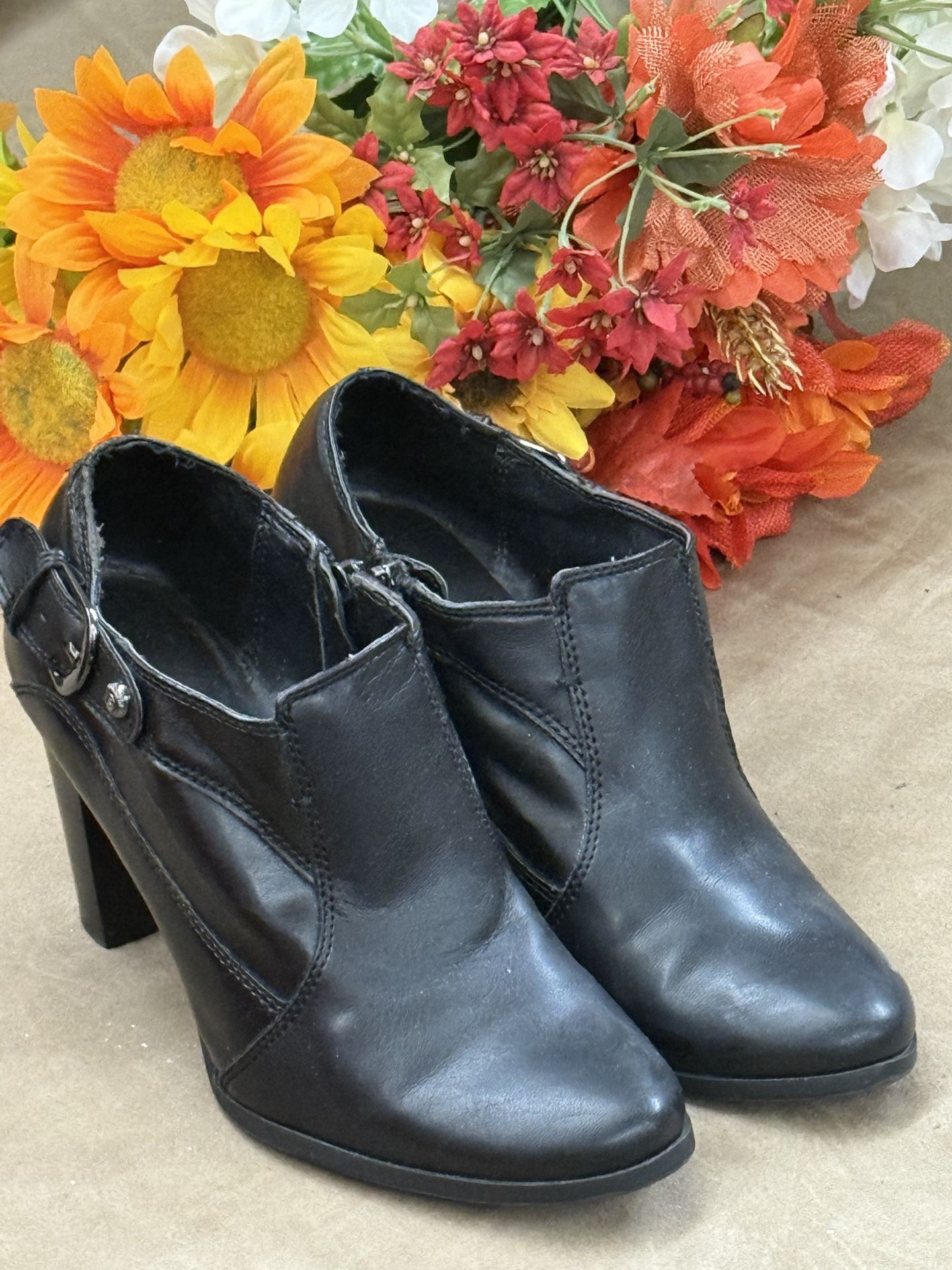 Women’s black heeled ankle booties
