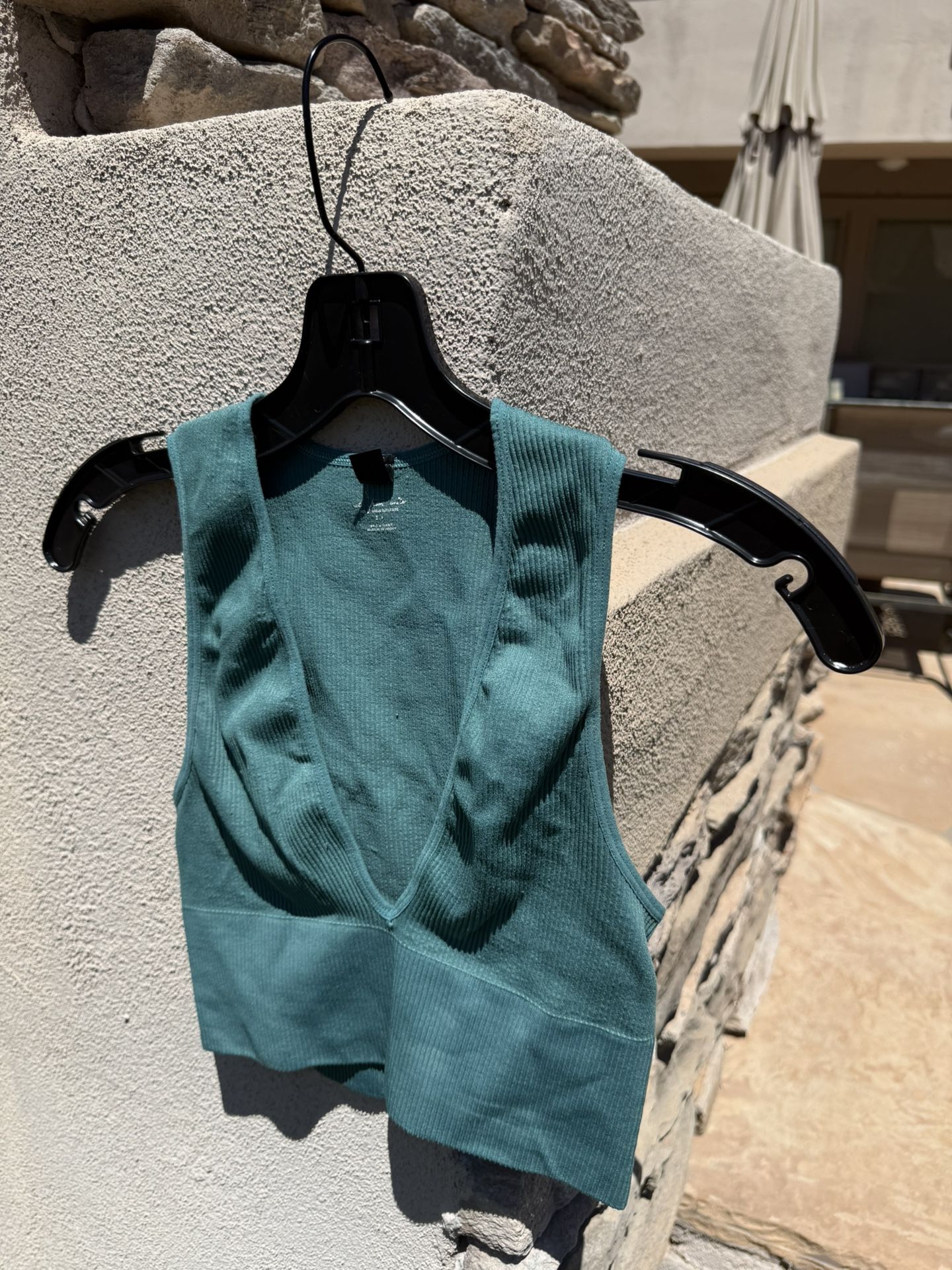 Green crop top women size small by urban outfitters Measurements Call in 14.5 inches in length and 11 inches across the chest, our pit to armpit