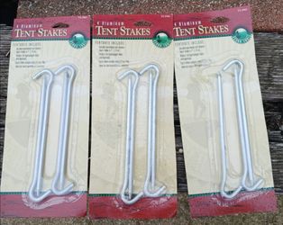 3 SETS OF NEW OZARK TRAIL ALUMINUM TENT STAKES 4 STAKES IN A PACKAGE FOR A TOTAL OF 12 STAKES
