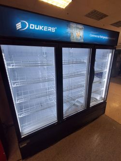 Merchandise sliding glass door cooler