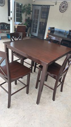 Wooden dining tables and 4 Chairs like New