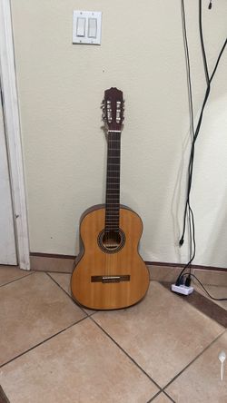Acoustic Guitar $60