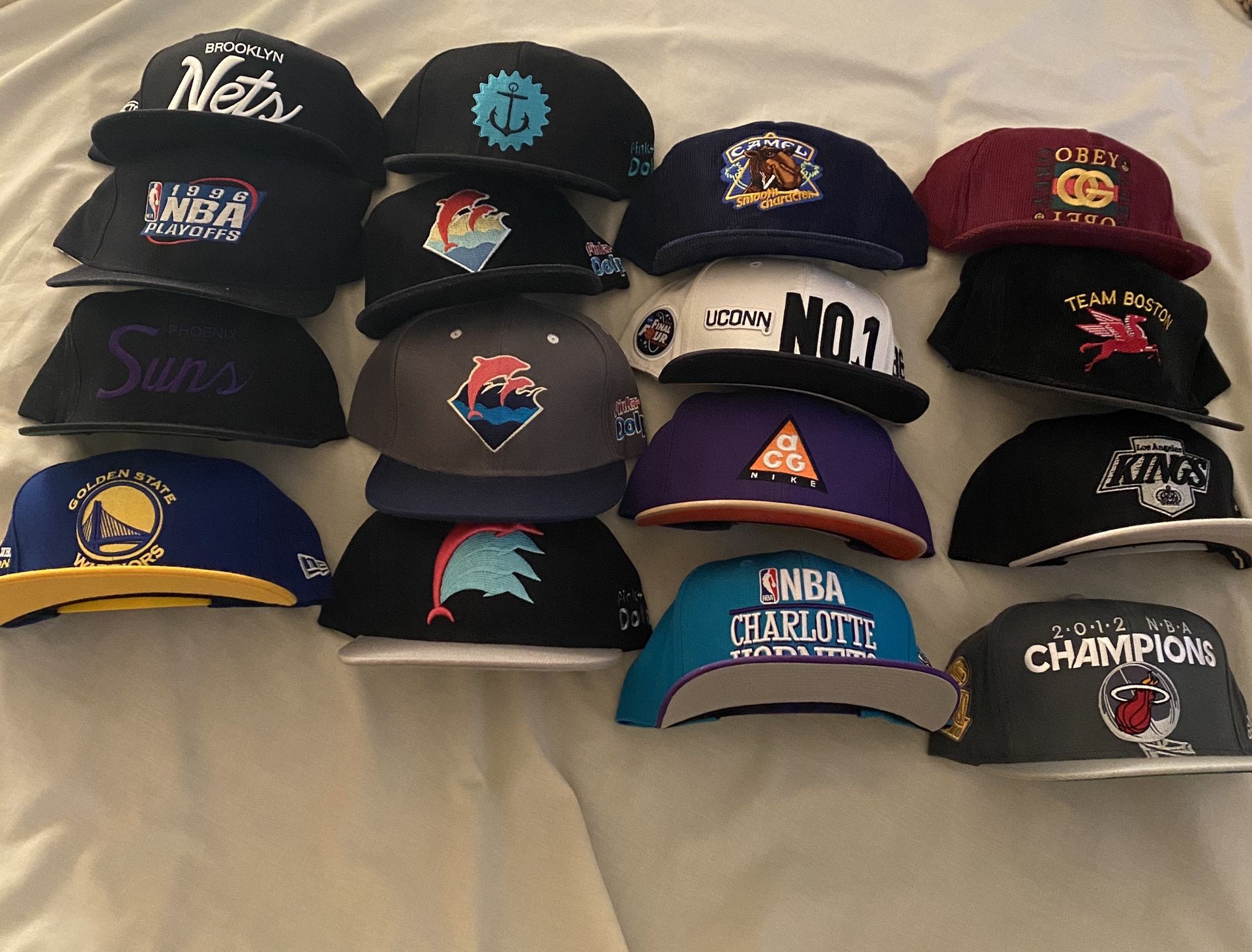 Snap backs/leather straps hats