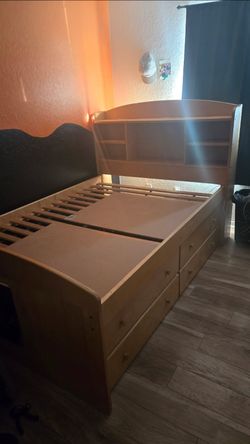 Wood full size custom bed with 4 drawers at bottom