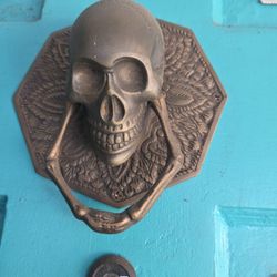 vintage solid brass skull door knocker