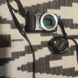 model no. nex-en sony camera camera only with battery And Lense