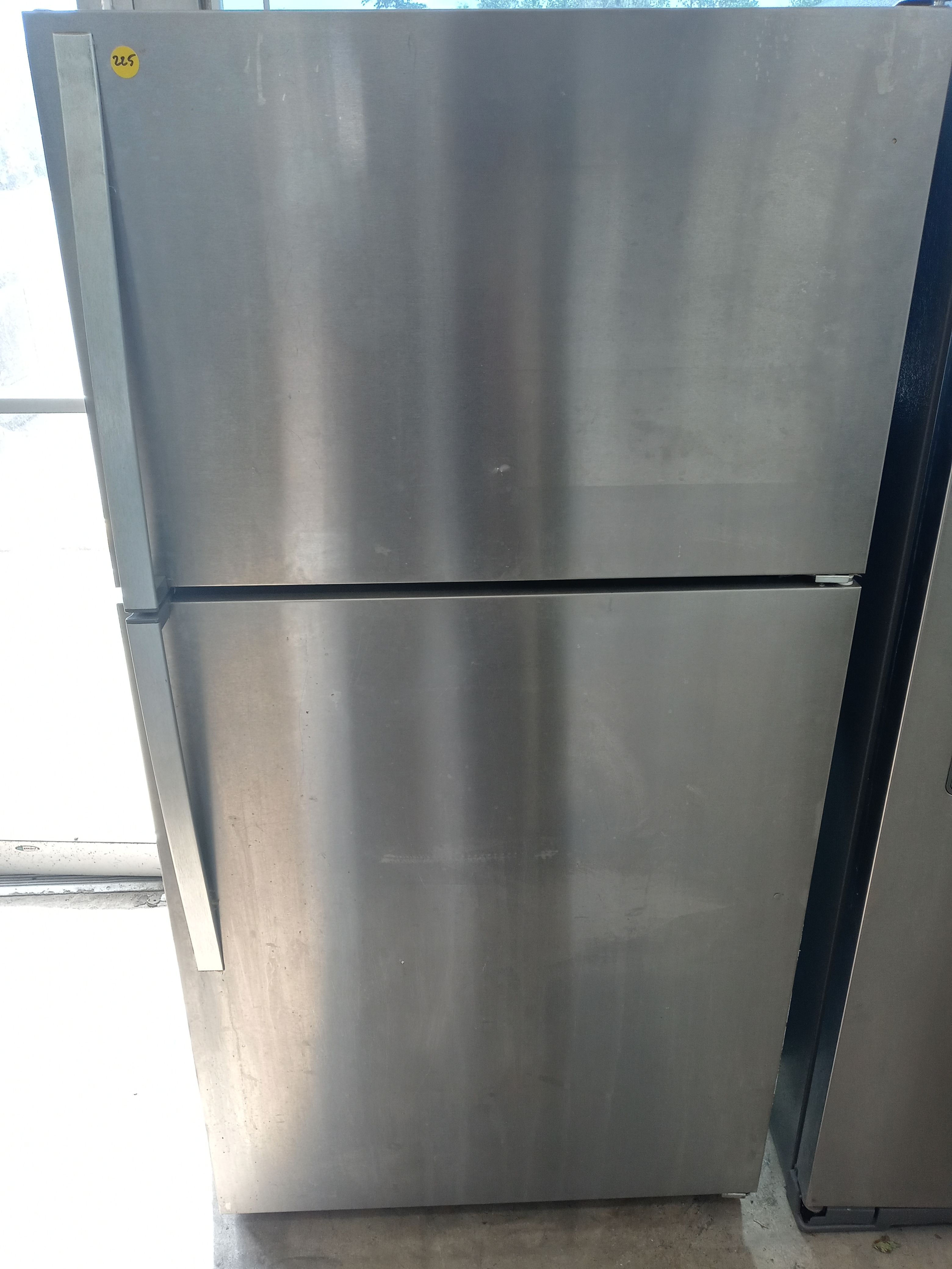 Whirlpool stainless steel top freezer refrigerator - Free delivery
