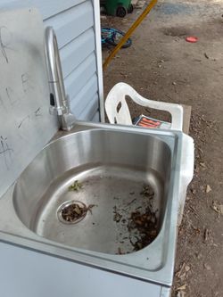 Glacier Bay drop in stainless steel sink/with faucet