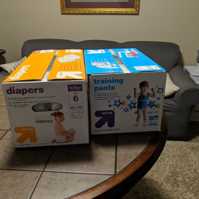 Target Brand UP & UP Diapers And Boys Training Pants And Eddie Bauer First  Adventure Place In Spaces Canyon Messenger Bag for Sale in Gulf Shores, AL  - OfferUp