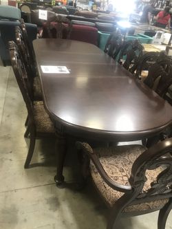 Dinning table and 8 chairs brand new