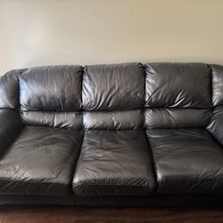 Leather couch with ottoman 