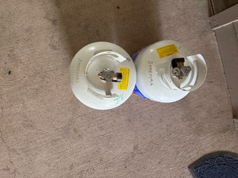 Propane Cylinders and stoves are for sale