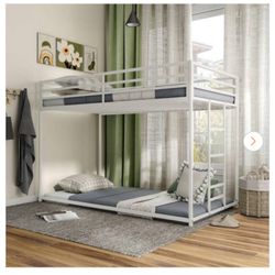 Hurwitz White Twin Low Profile Metal Bunk Bed  Installed never used. Only put clothes on it. If yiu buy online. Only come with one ladder. But this on
