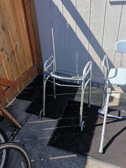 Two shower chairs heavy duty plus drive medical folding walker two buttons with 5" wheels plus one cane plus two adjustable safety bed rails Everythin