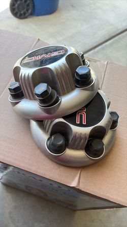 2 gmc Sierra hub cap covers