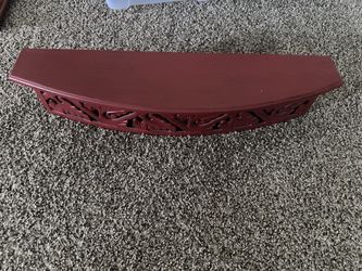Dark red decorative shelf