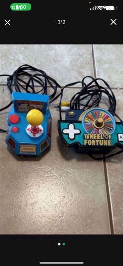 Miss Pac-Man and wheel of Fortune plug-in play games