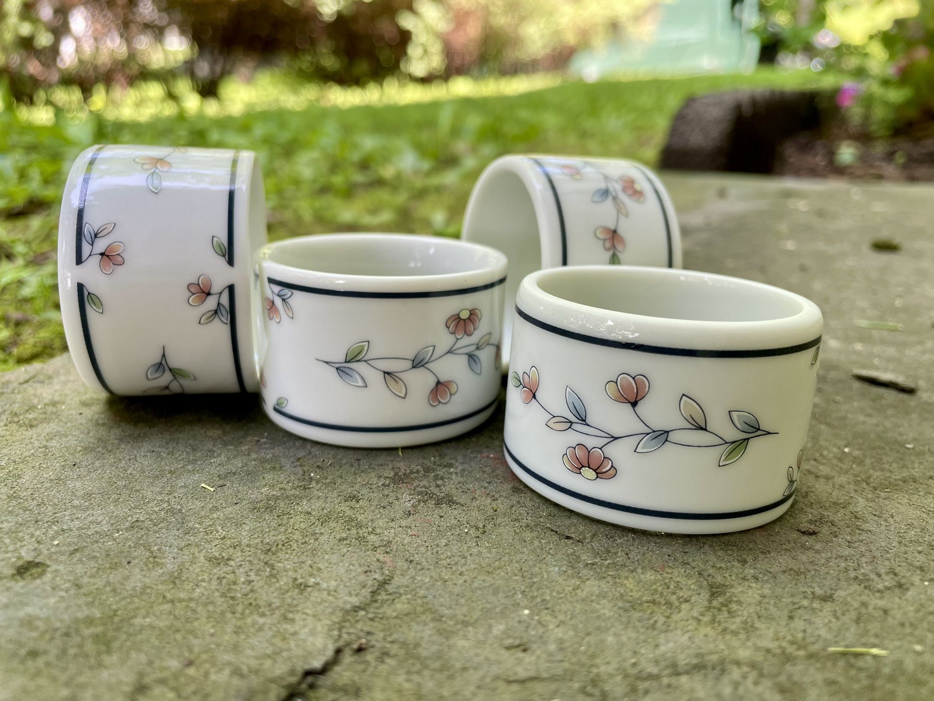 NWT porcelain floral napkin rings. Made in the 1980s.
