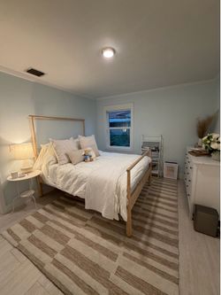 Bed and queen mattress (In perfect condition)