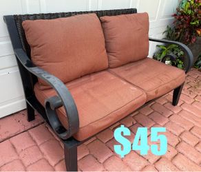 $45 Patio Bench with Sunbrella cushion,bench have small peel in a Conner but is very sturdy no rust