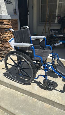 Large full-size wheelchair with full leg support. Brand new. Large wheels per injured disabled handicap person.