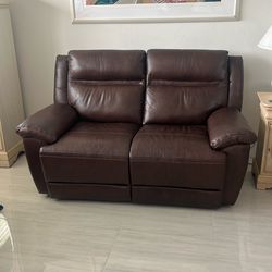 Brown Leather Reclining Love Seat