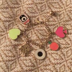 KATE SPADE CHARM BRACELET  NEW YOR DESIGN  GOLD TONE EXCELLENT CONDITION 
