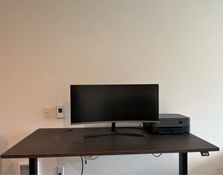 Dark wood and black standing desk
