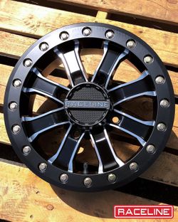 BIG SALE On RACELINE 15x7 4x137 beadlock wheels & 321015 tires for can am maverick & honda talon utv sxs (we finance)