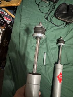 Kyb gas-a-just front shock absorbers pair