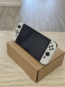 Nintendo Switch OLED (White Joy-Con) (HEG-001) – starting from $199