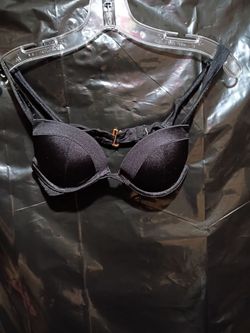 Black padded push up or plunge underwire bra.