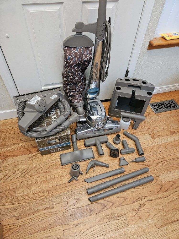 BRAND New KIRBY VACUUM WIT ATTACHMENT  , SHAMPOO SYSTEM   , AMAZING POWER SUCES.   IN THE BOX 
