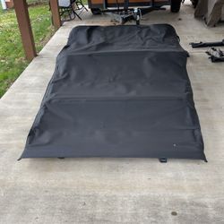 4 Door Jeep Wrangler stock Softtop with tinted windows and all Mounting hardware.