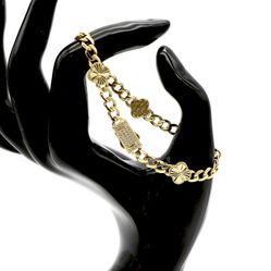 14K Gold Curve Link Clover Station Bracelet. 7.25"L x 5mm links, 5 9mm clover stations. ONLY$900