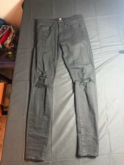 Black distressed denim jeans