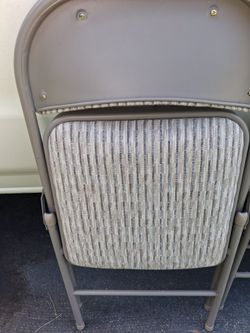 Folding metal chairs