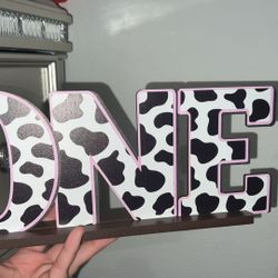 Cow One Letter Sign