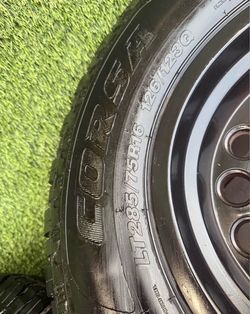 Corsa LT285/75r16 126/123q set of two tires and rims.