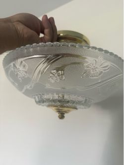 pressed-glass flush-mount ceiling light fixture.